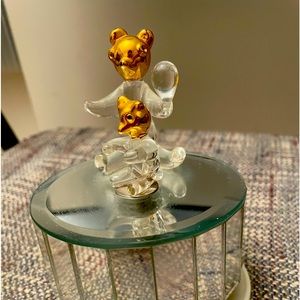 Rare vintage music box with rotating glass mirror base.